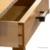 Close up photo showing the hand cut dovetails used in the drawer joinery