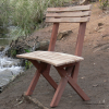 Photo of bench near some rapids